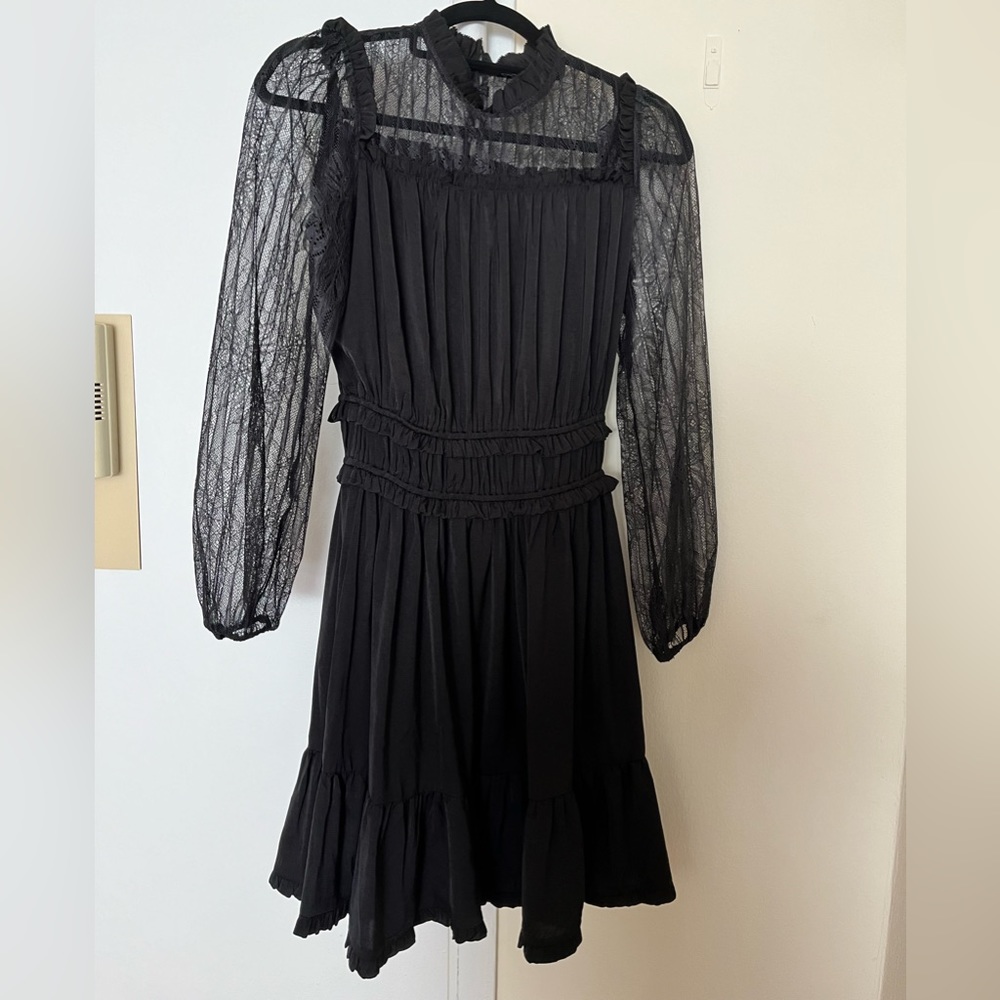Current air dress. Took off the tags but never wore it. In excellent condition.